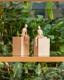 Escultura Menina Sentada em Polirresina
