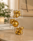 Escultura Decorativa Orbit Dourada em Metal e Acrílico – 26 cm